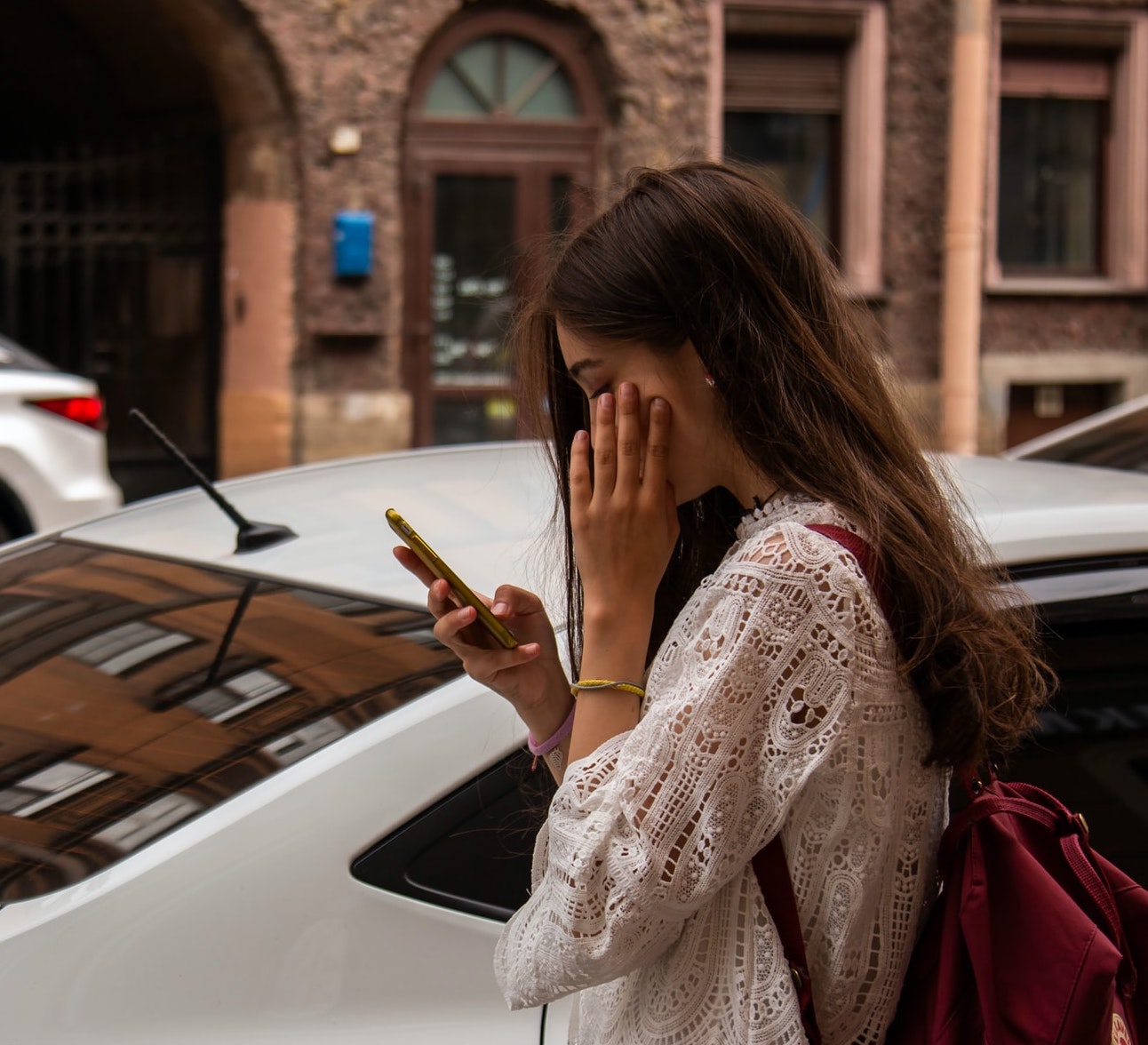 woman walking into an rideshare